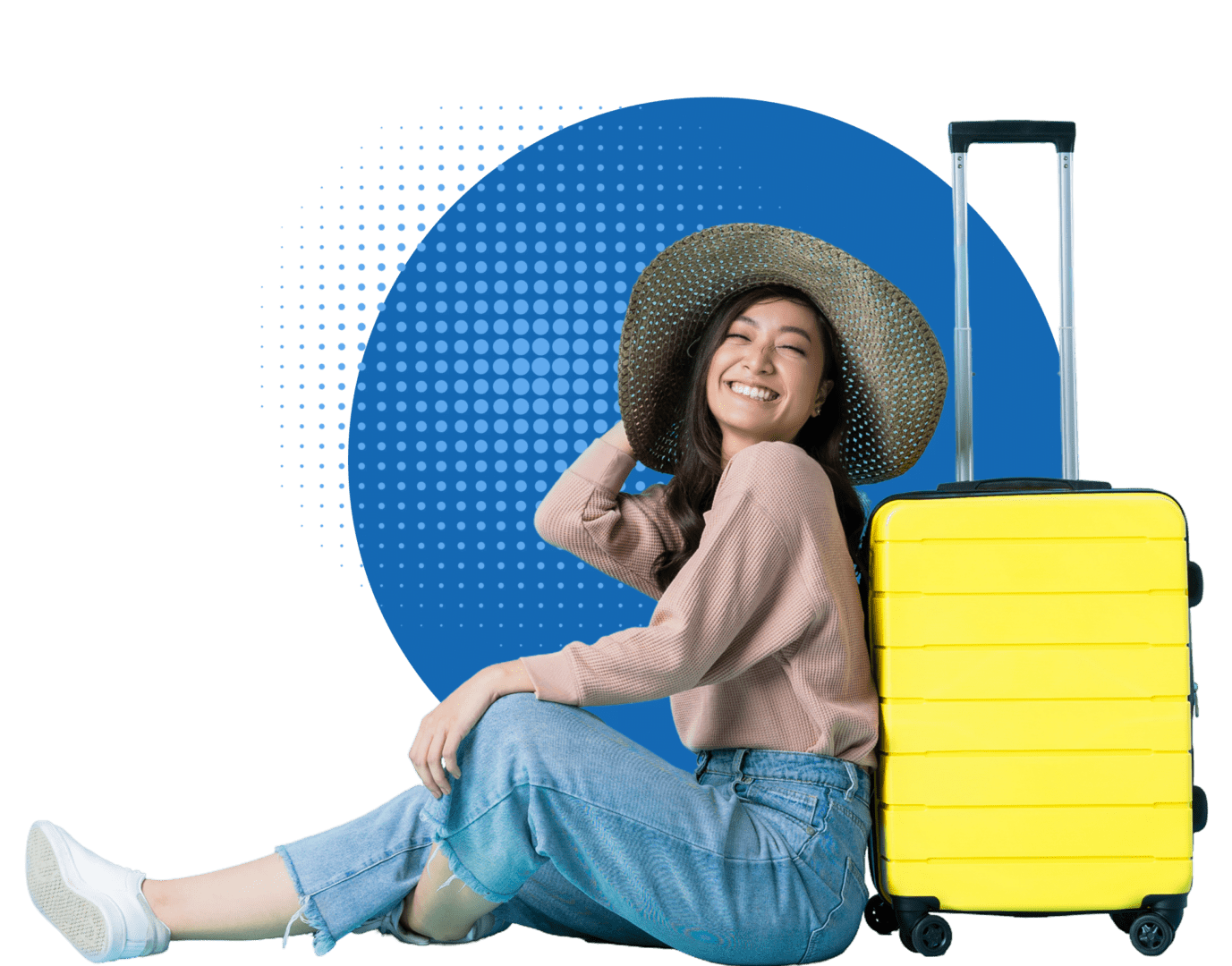 A woman sitting on the ground with her luggage.