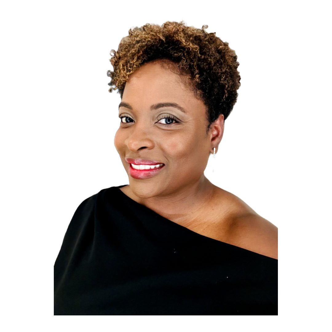A woman with short hair is smiling for the camera.